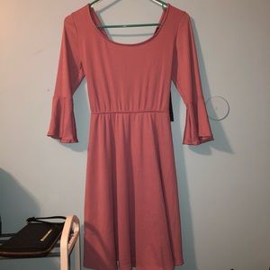 Pink dress with a bow tie in the back